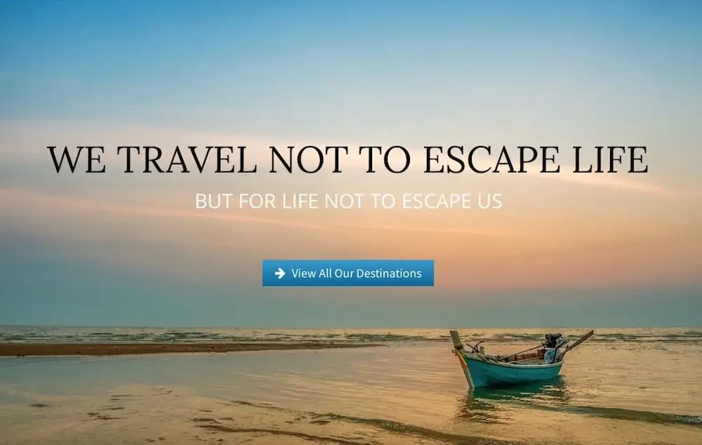 website header for E& T Jolley Travel Services - small boat floating in ocean